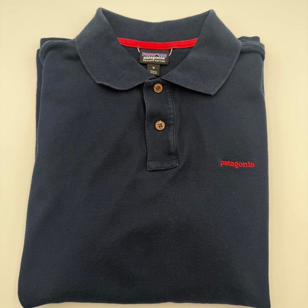 Organic cotton Patagonia polo navy red. Tagged size medium but fits like a small